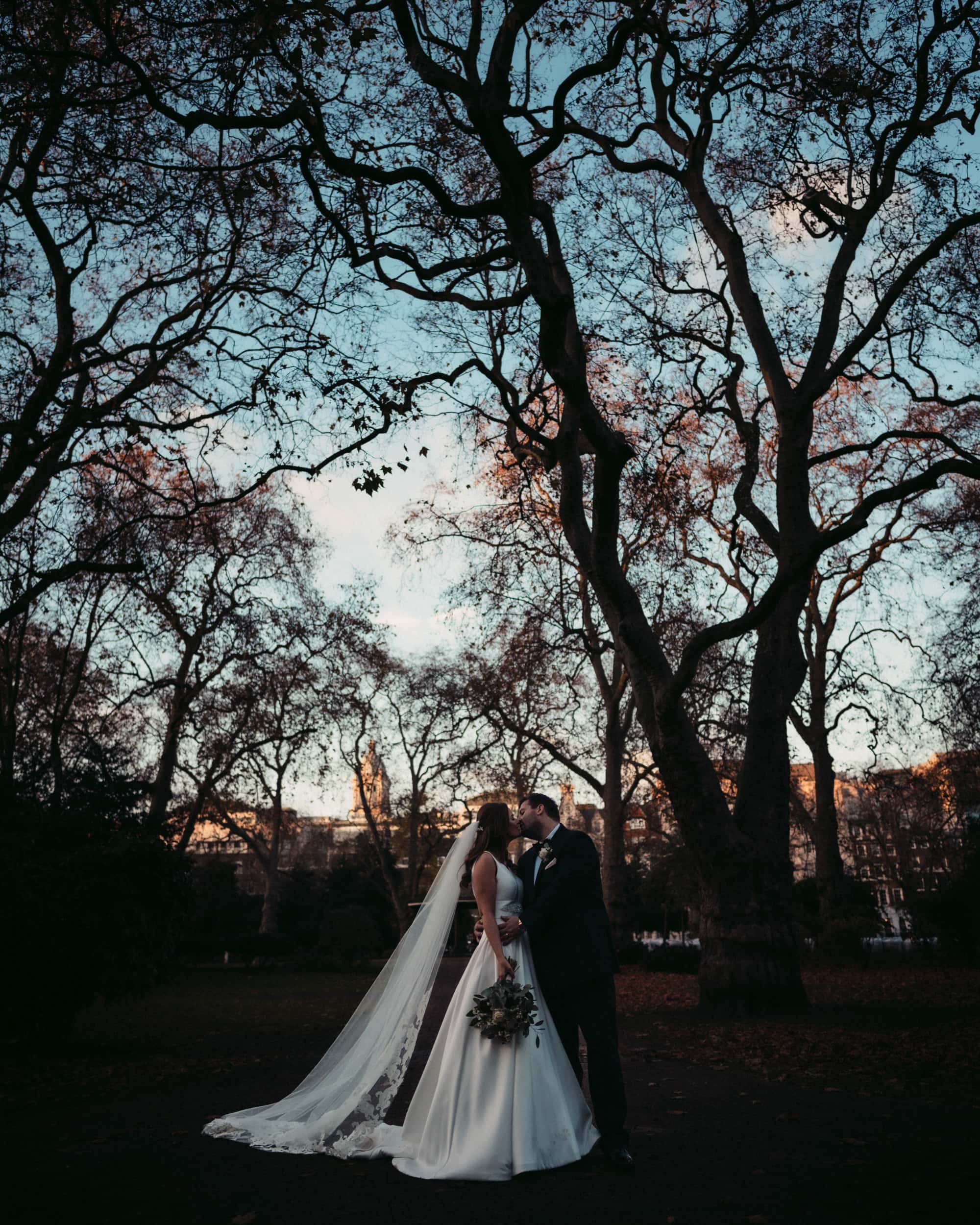bride and groom in Lincolns Inn fields at sunset